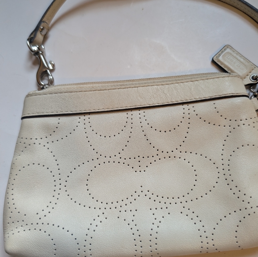 Coach perforated logo leather wristlet in a off-white color in VGUC - Picture 6 of 16